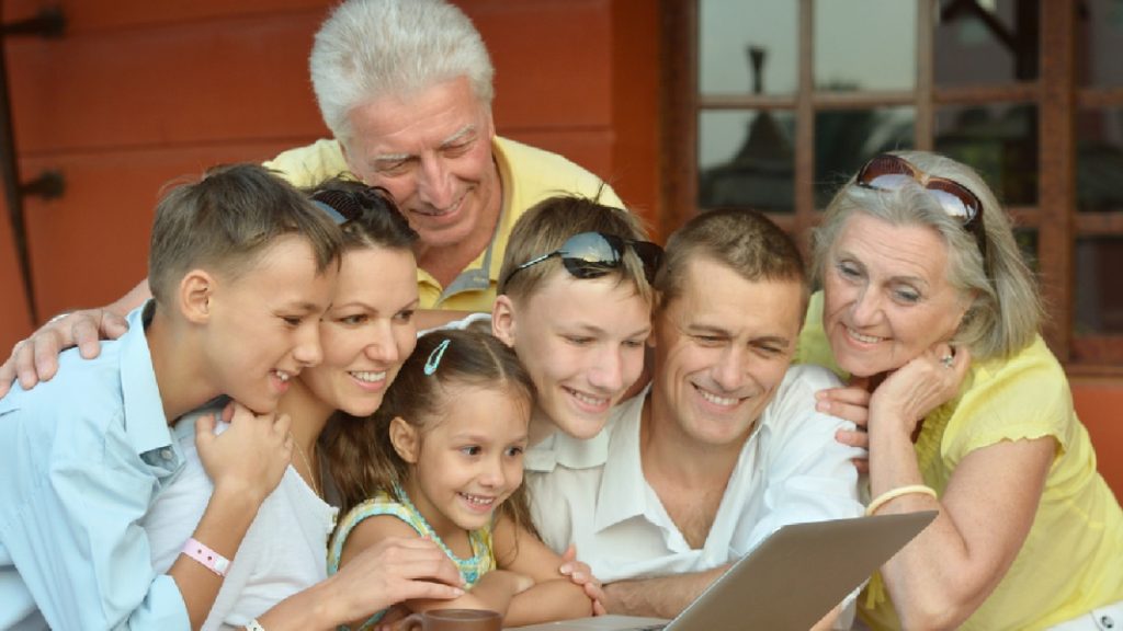 Family looking at laptop for Mortgages